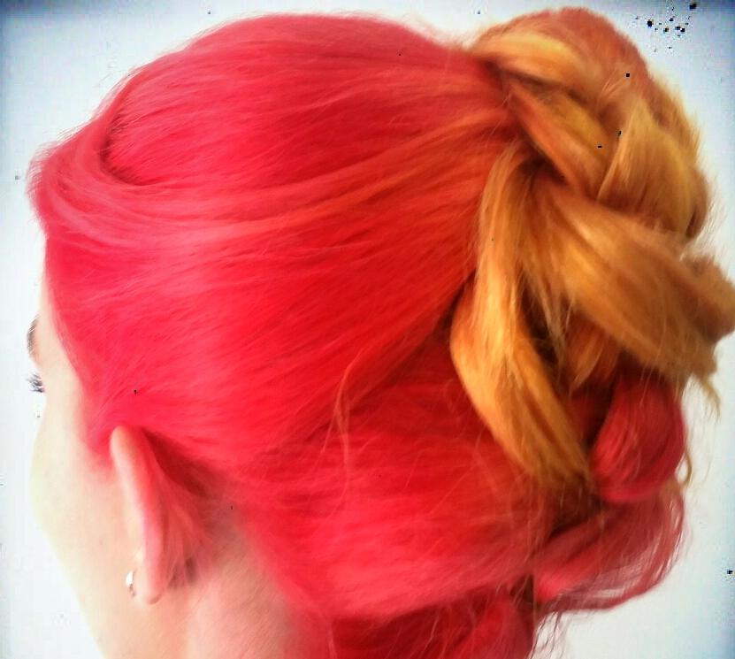 Vivid coral and orange braided updo