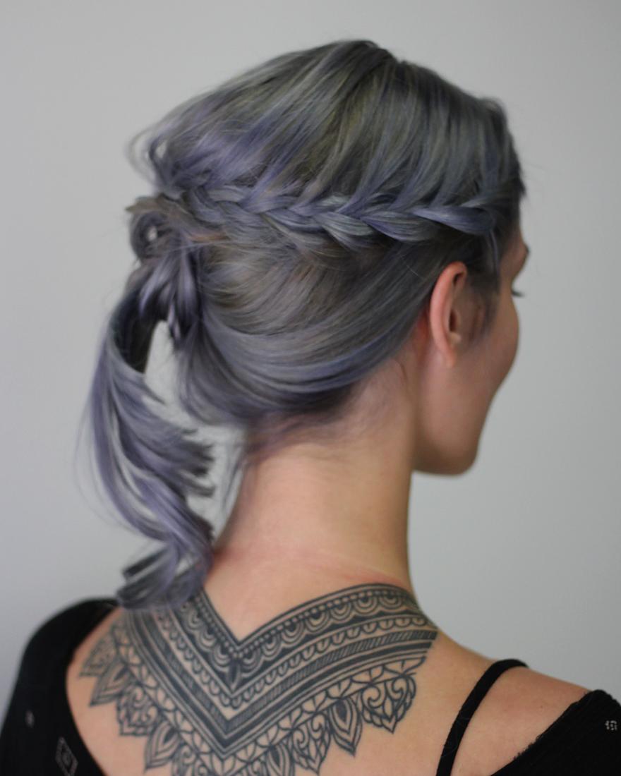 Silver-lavender braided crown twisted into a low knot