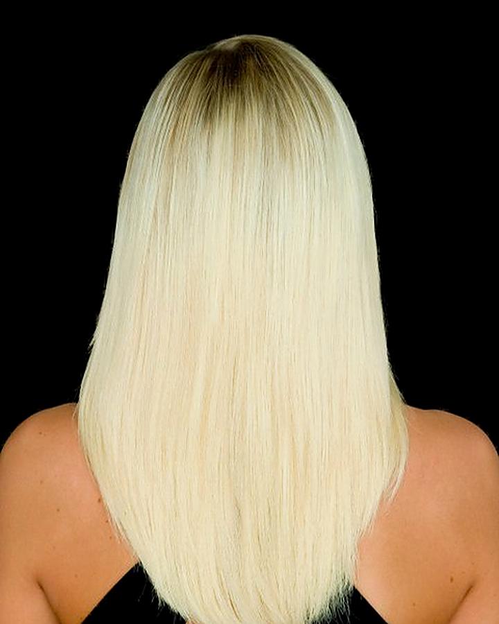 After: long, full, sleek platinum hair
